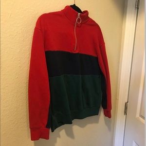 red, blue, and green sweater